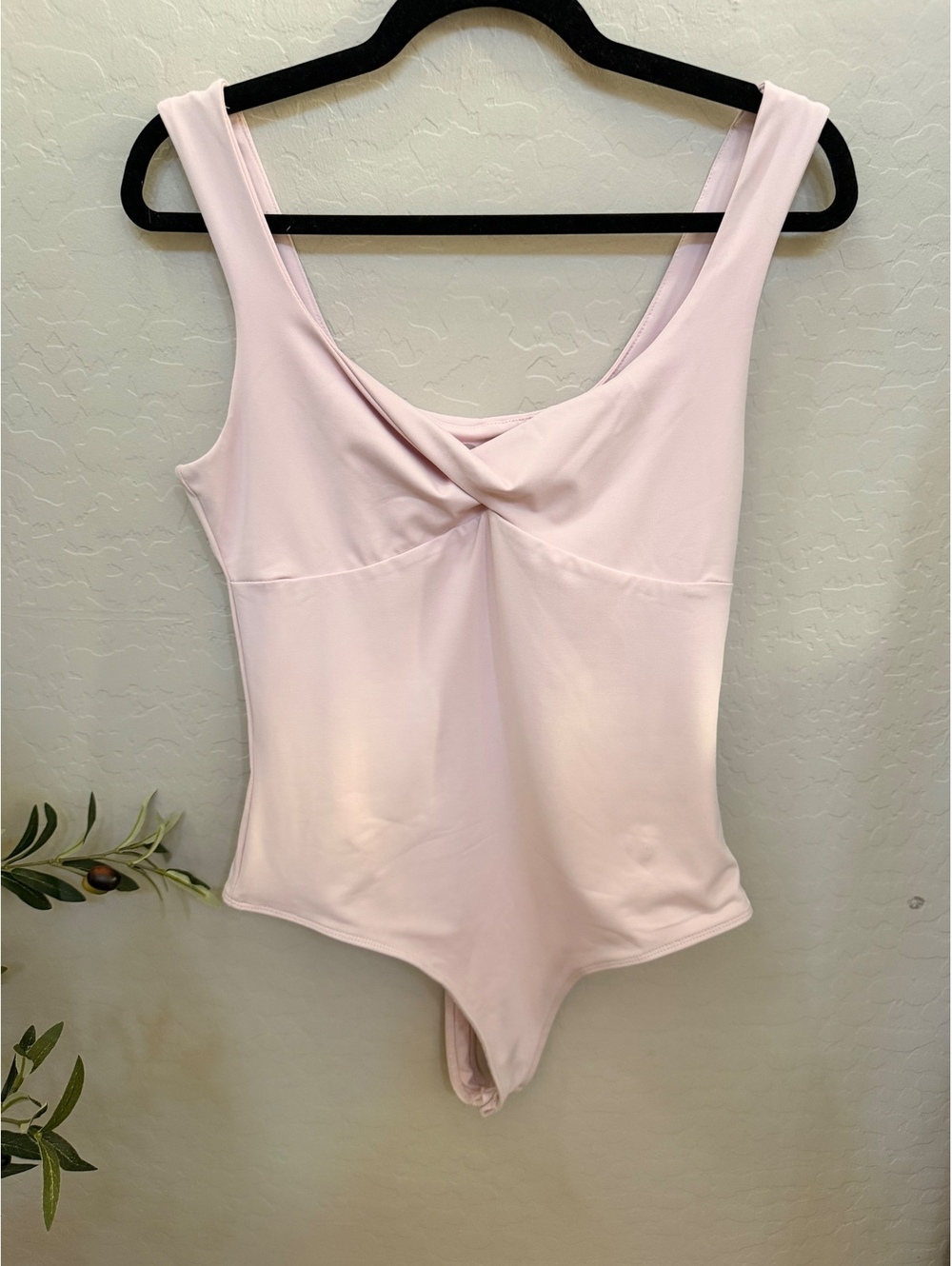 SO pink bodysuit